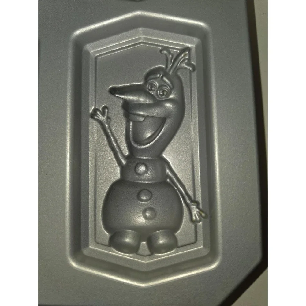 Nordic Ware Disney Frozen 2 character cakelet pan is made of heavy cast aluminum